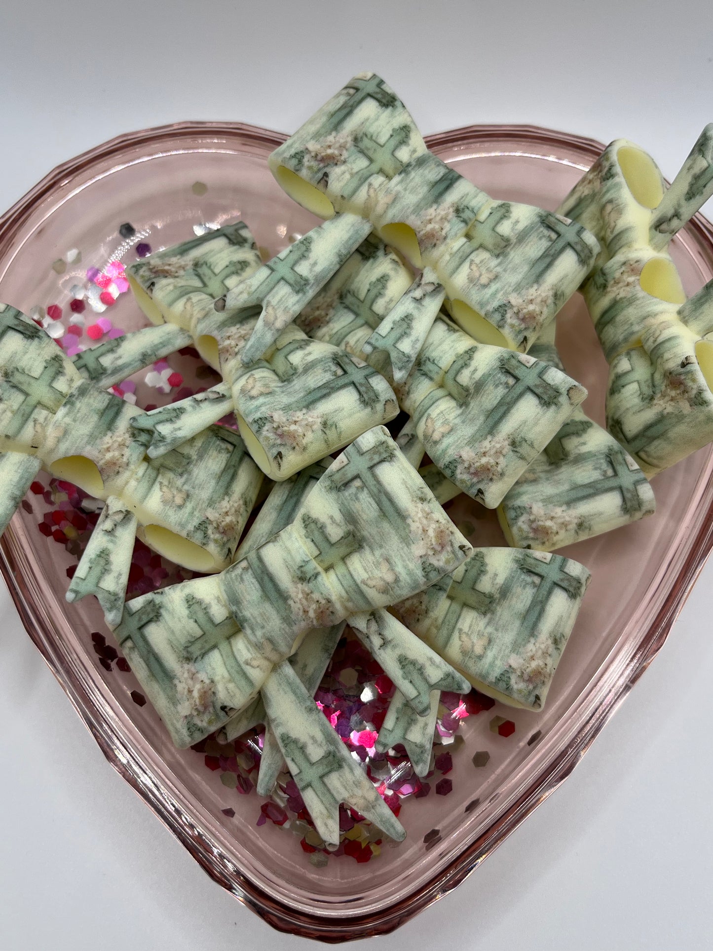 Cross and flowers silicone bow