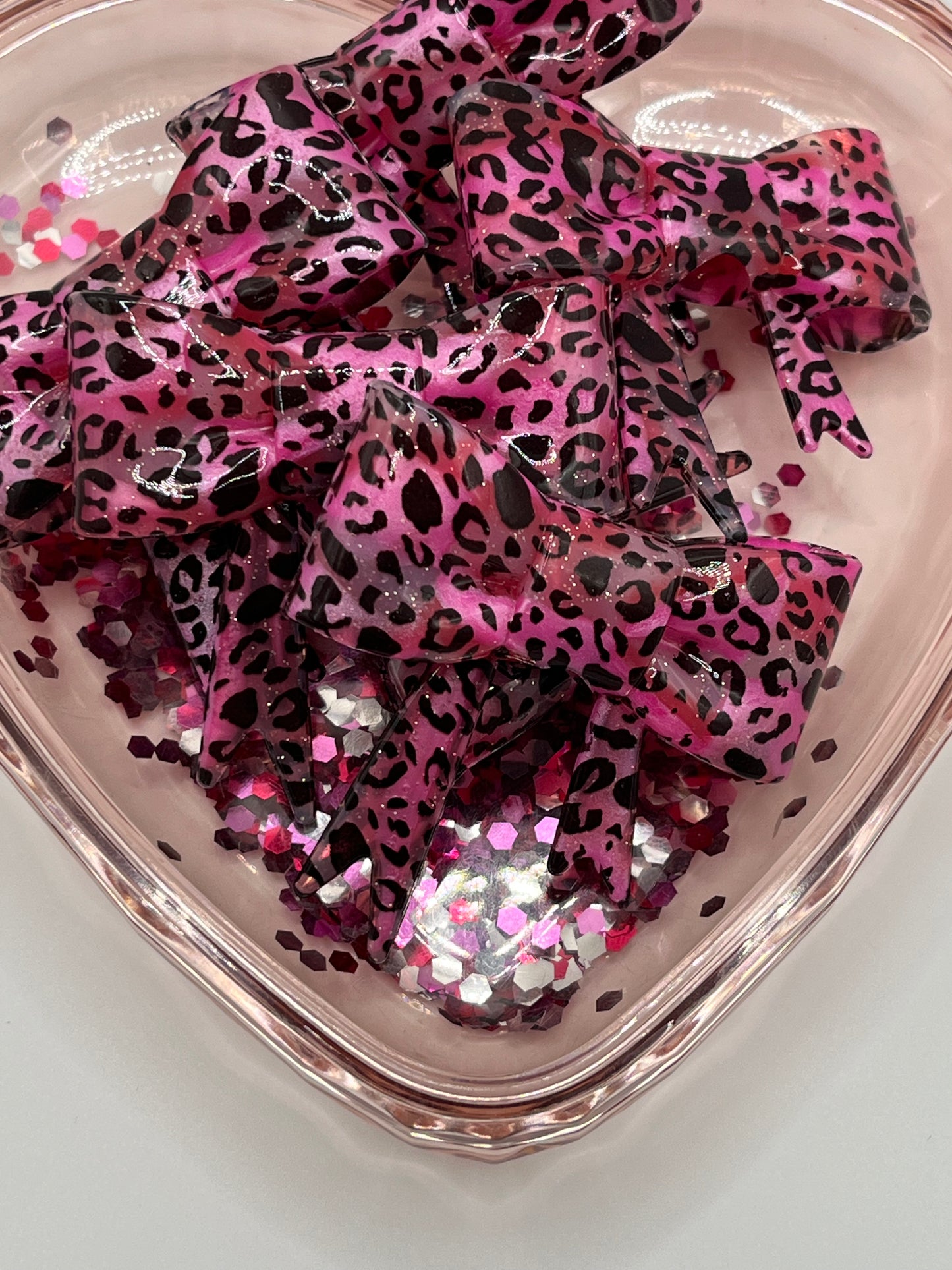 Pink swirl glitter cheetah bow