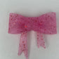 Pink with red glitter silicone bow