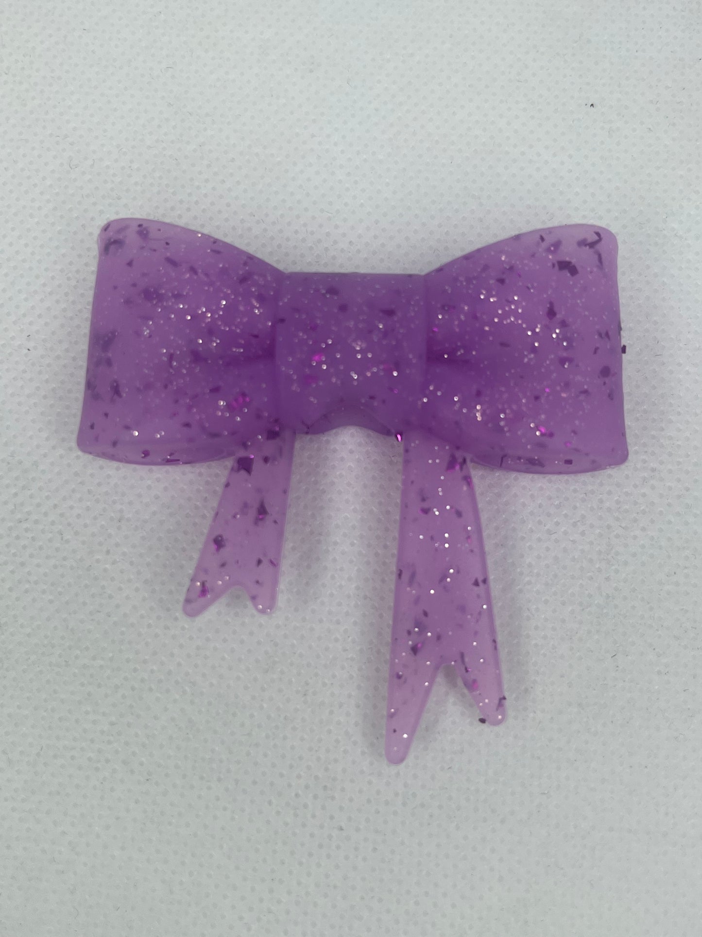 Purple glitter silicone bow