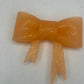 Orange glitter silicone bow