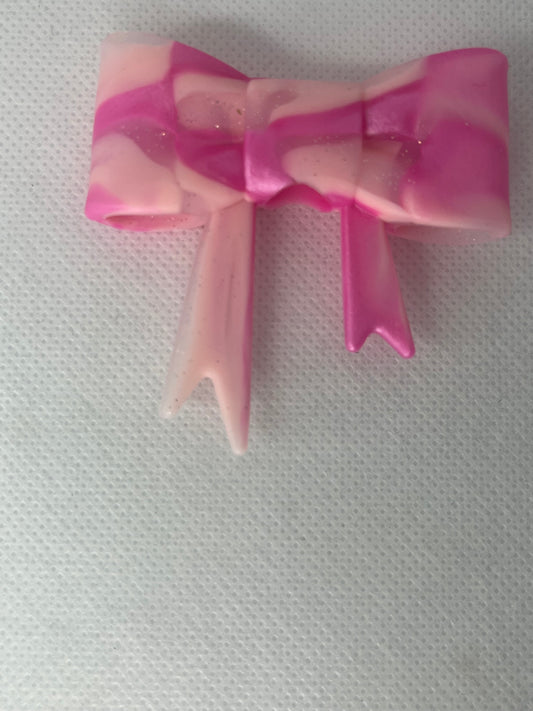 Solid pink swirl silicone bow