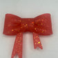 Red with gold glitter silicone bow