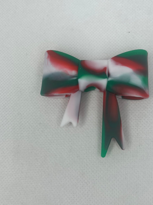 Red and green swirl silicone bow