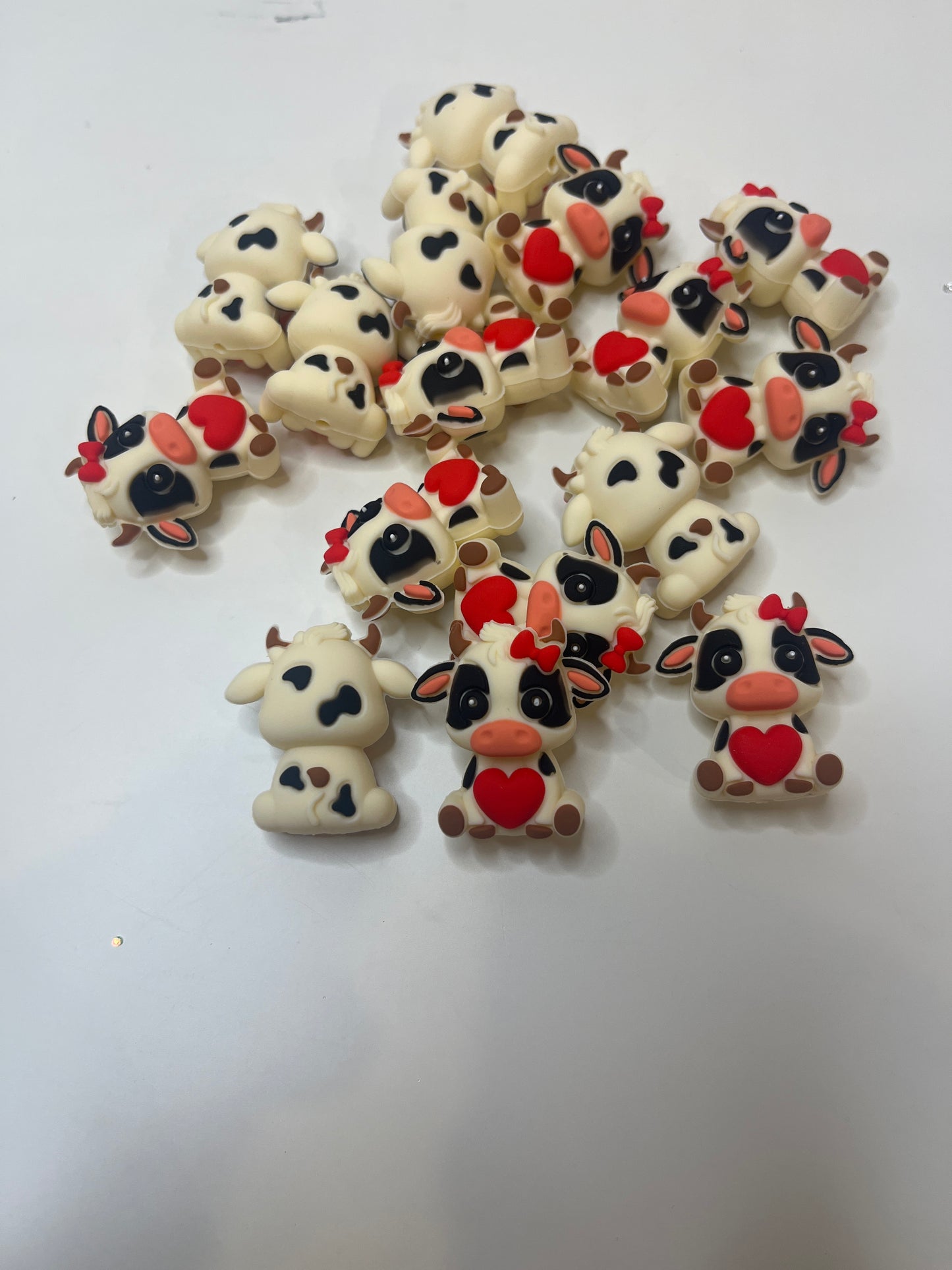 3d cow with red heart and bow