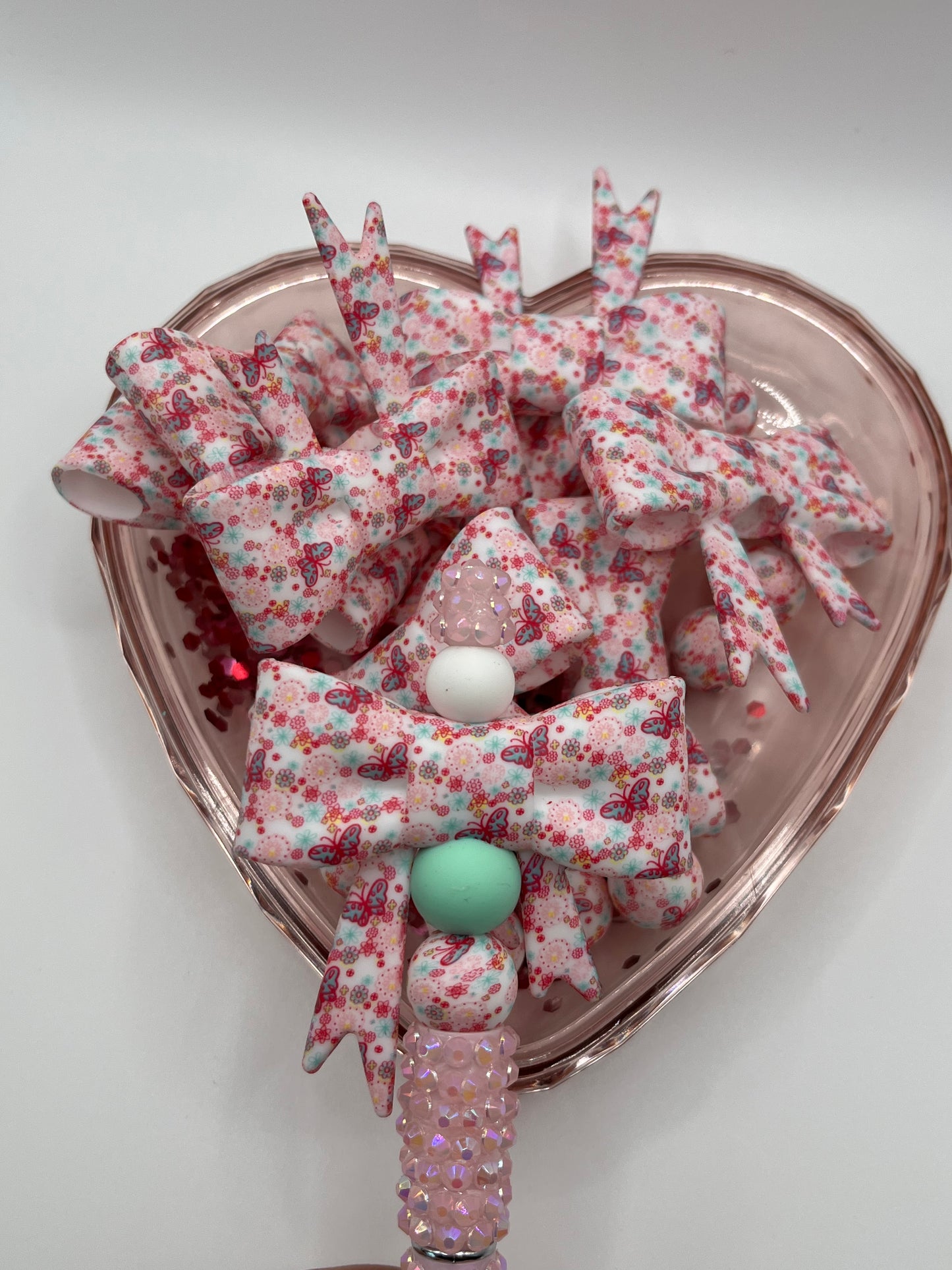 Pink butterfly’s silicone bow and matching beads SOLD INDIVIDUALLY!