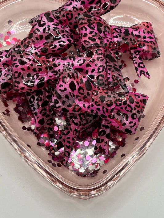 Pink swirl glitter cheetah bow
