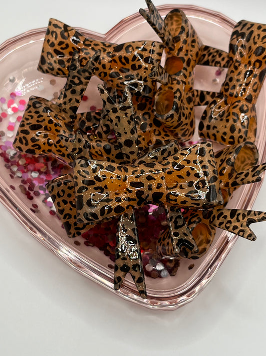 Orange glitter cheetah bow